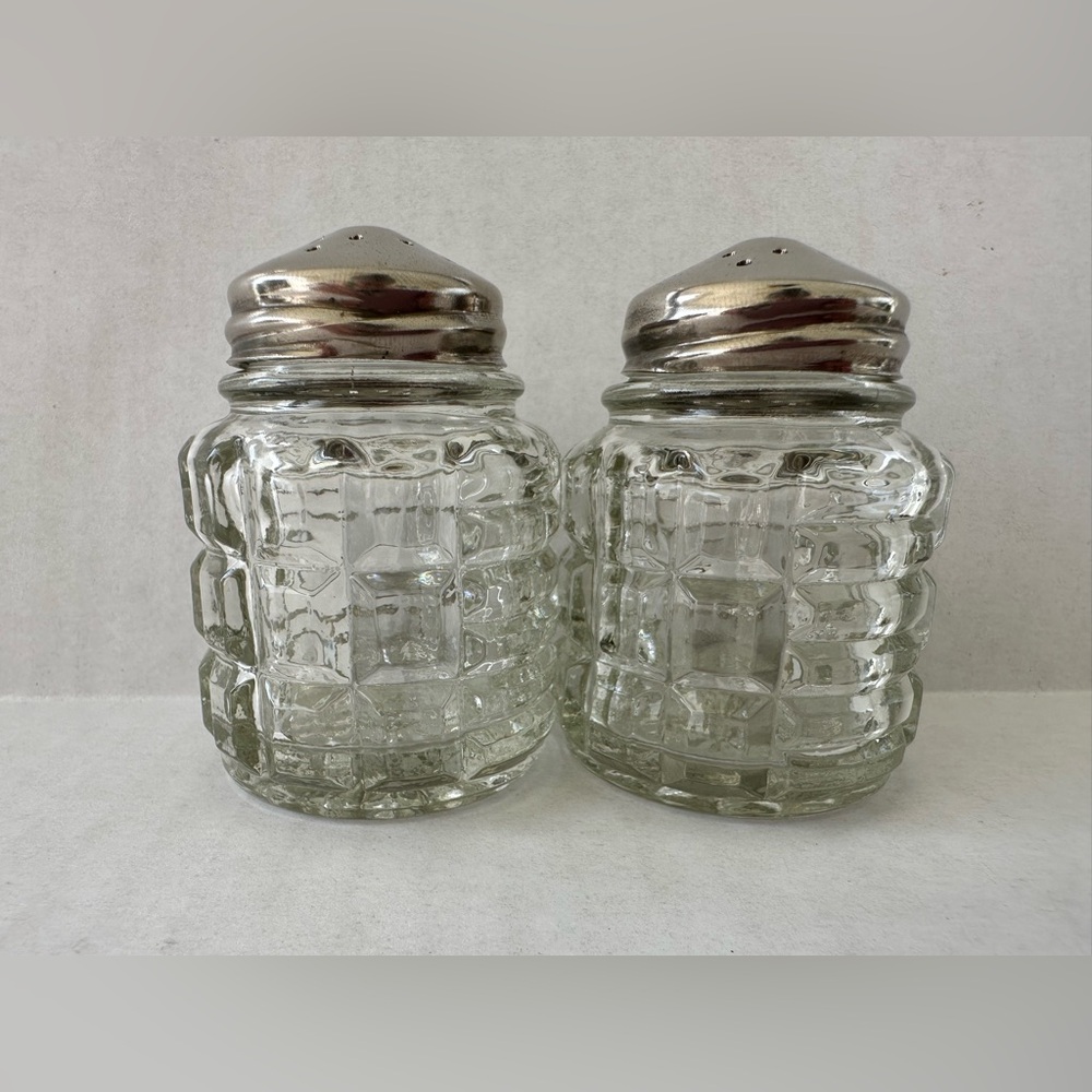 Vintage Clear Glass Salt and Pepper Shakers with Silver-Tone Lids
